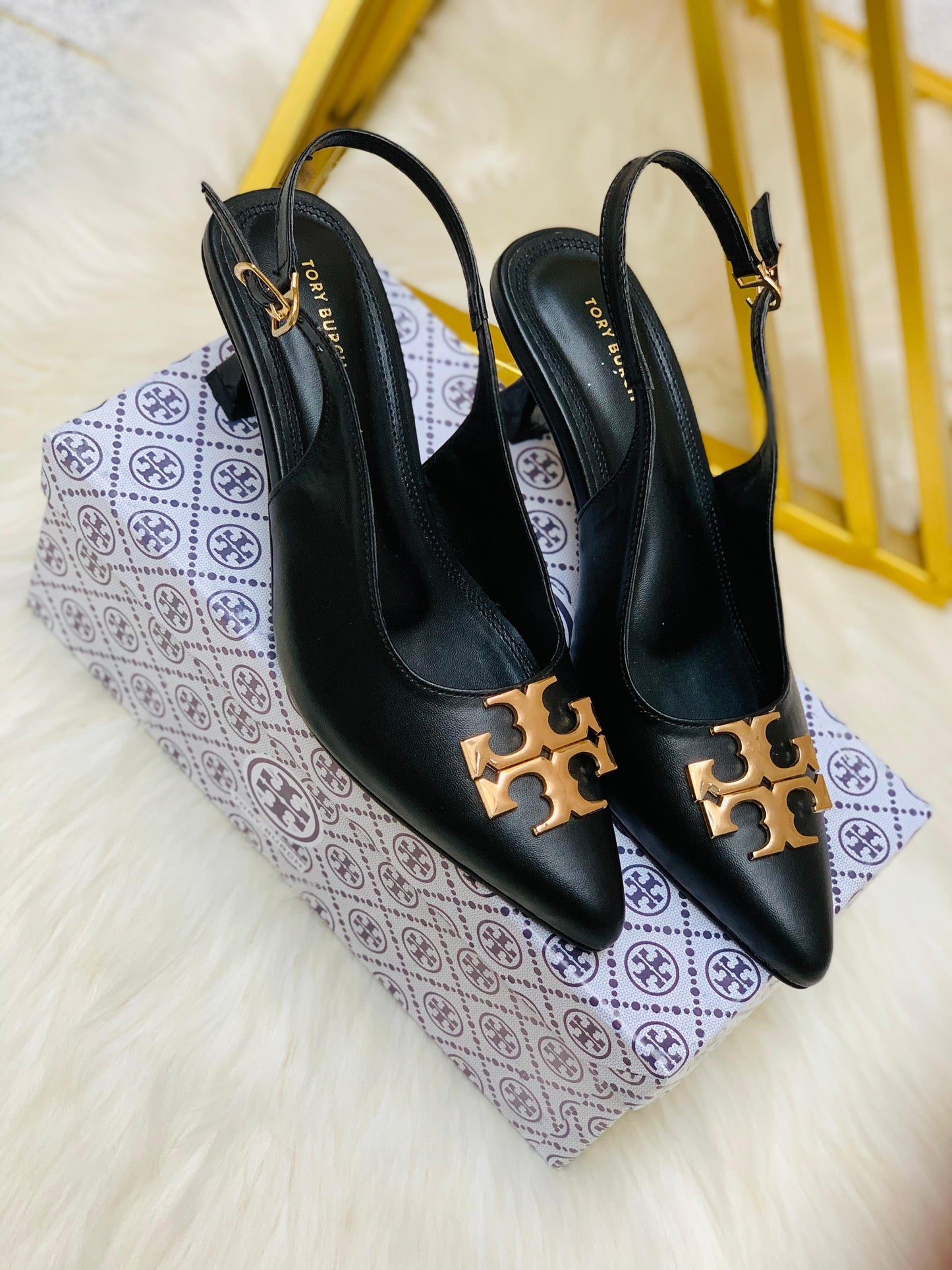 Tory pointed heels