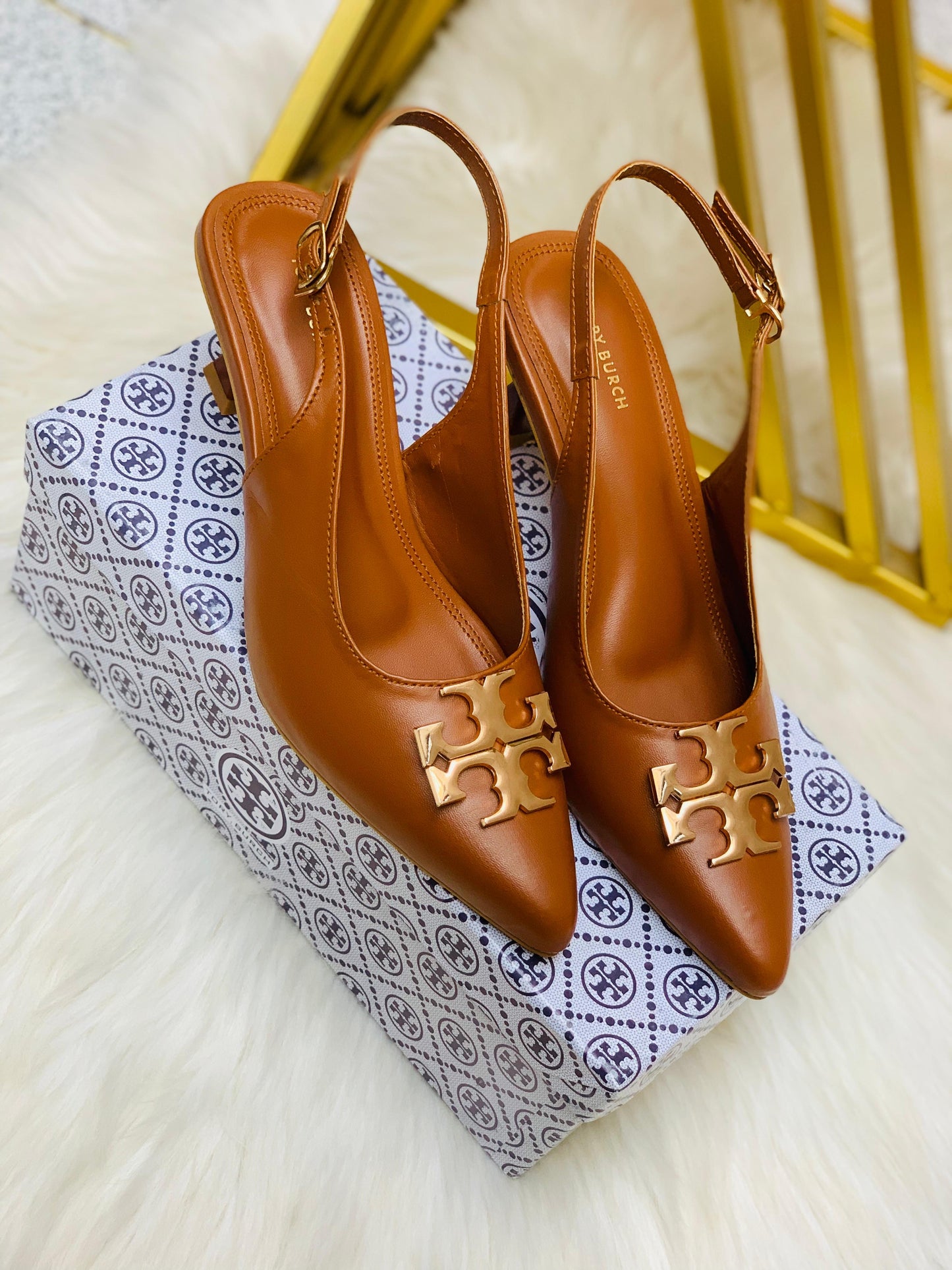 Tory pointed heels
