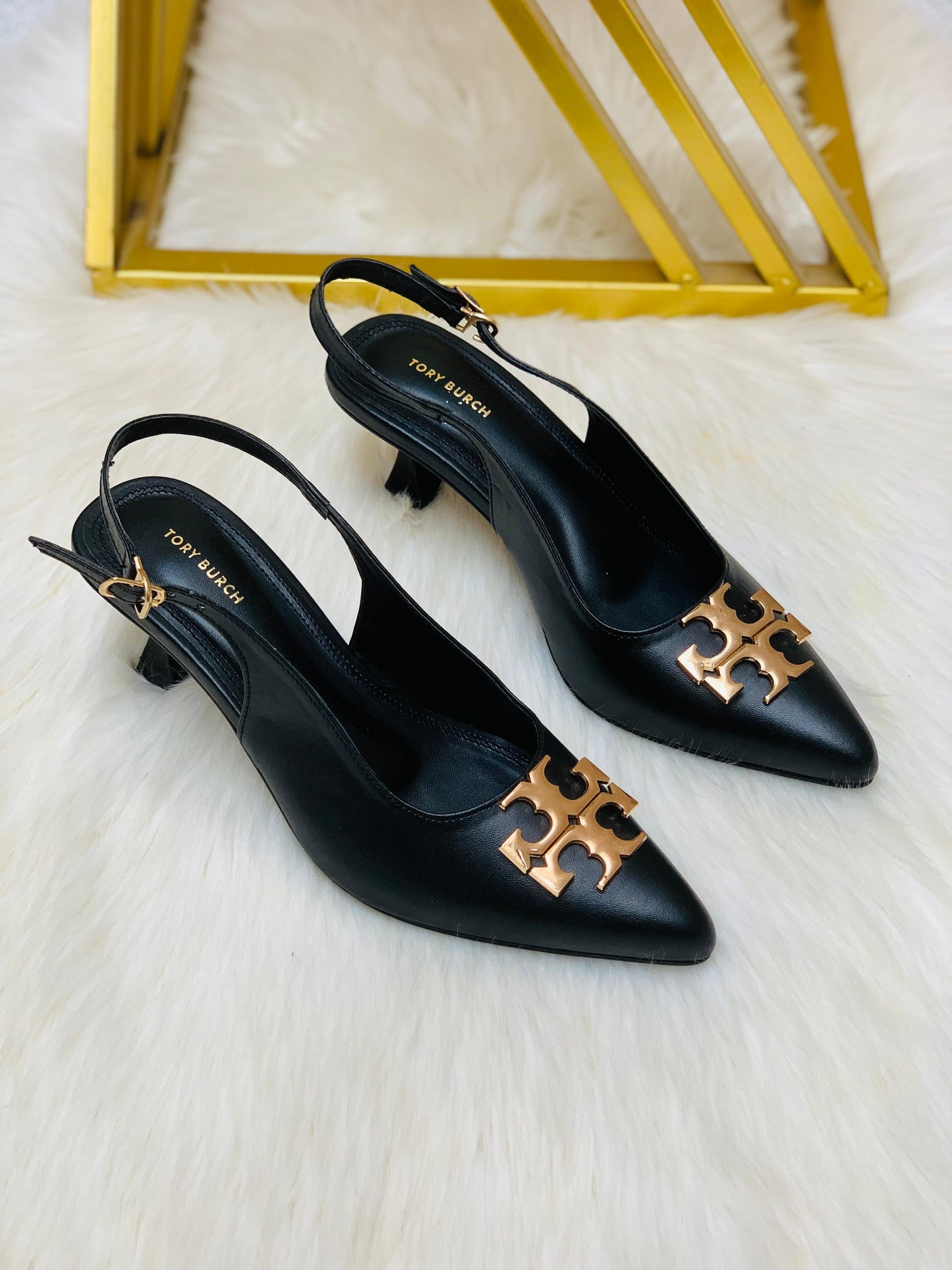 Tory pointed heels