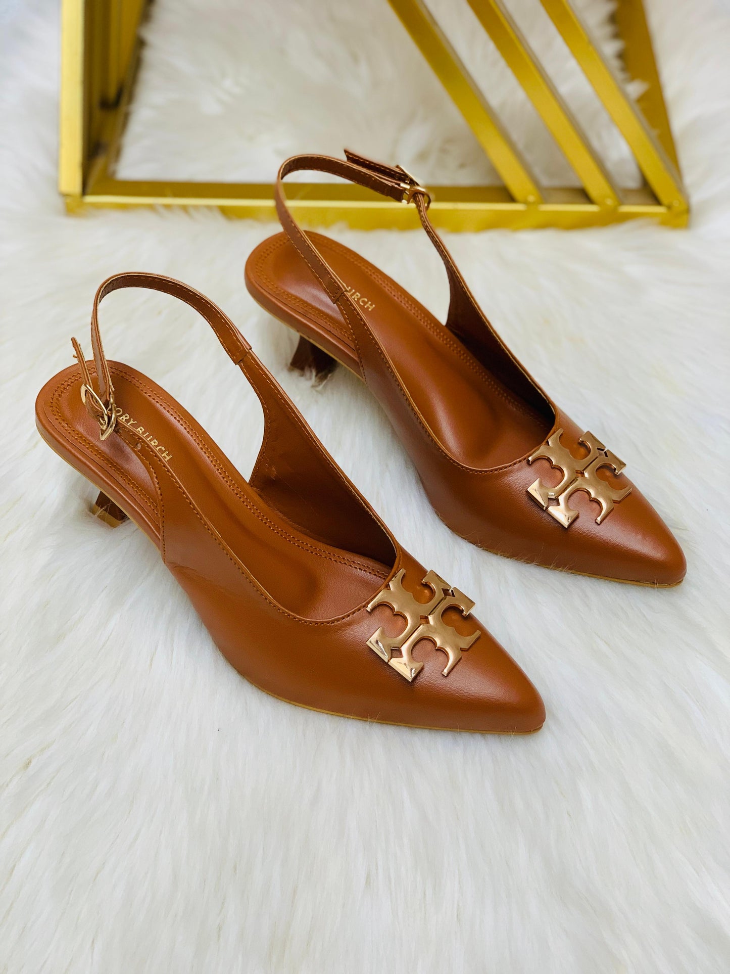 Tory pointed heels